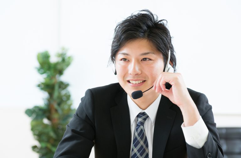 Japanese businessman wearing headset